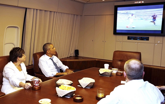 U.S. President Obama and his senior advisor Jarrett watch the U.S. and Germany World Cup soccer match while aboard Air Force One