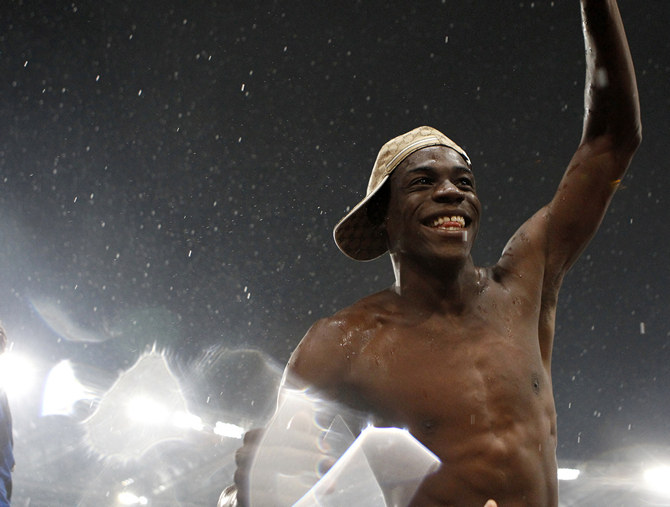 Inter Milan Balotelli celebrates after winning the Italian Cup final soccer match at the Olympic stadium in Rome