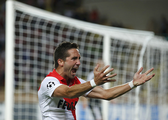 AS Monaco's Moutinho celebrates after scoring the first goal for the team during their Champions League Group C soccer match against Bayer Leverkusen at Louis II stadium in Monaco