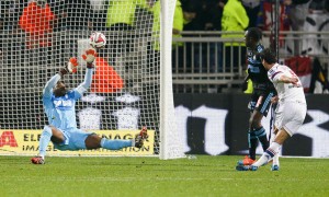 Olympique Lyon's Yoann Gourcuff shoots to score against Olympique Marseille during their French Ligue 1 soccer match in Lyon