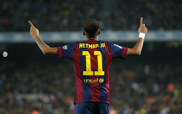 Barcelona's Neymar celebrates a goal against Sevilla during their Spanish first division soccer match at Camp Nou stadium in Barcelona