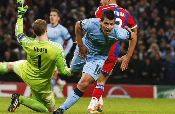 Manchester City's Aguero celebrates after he scored the winning goal against Bayern Munich's Neuer during their Champions League Group E soccer match in Manchester