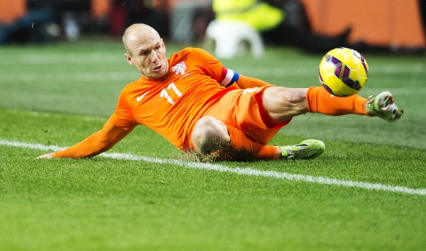 Arjen Robben of the Netherlands fights to control the ball against Mexico during their international friendly soccer match in the Amsterdam Arena