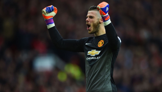 MANCHESTER, ENGLAND - MAY 17:  David De Gea of Manchester United celebrates as Ander Herrera scores their first goal during the Barclays Premier League match between Manchester United and Arsenal at Old Trafford on May 17, 2015 in Manchester, England.  (Photo by Shaun Botterill/Getty Images)